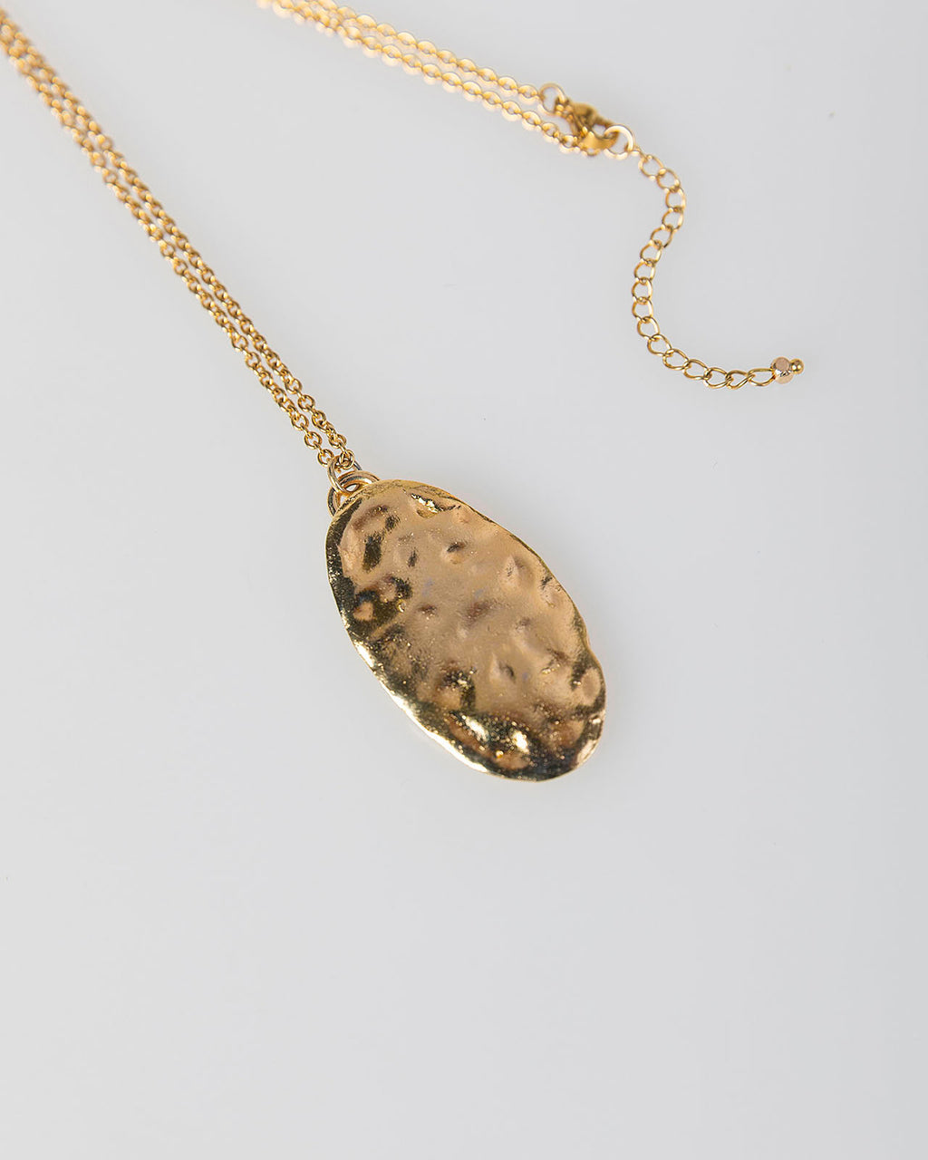 Collar largo pieza dorada