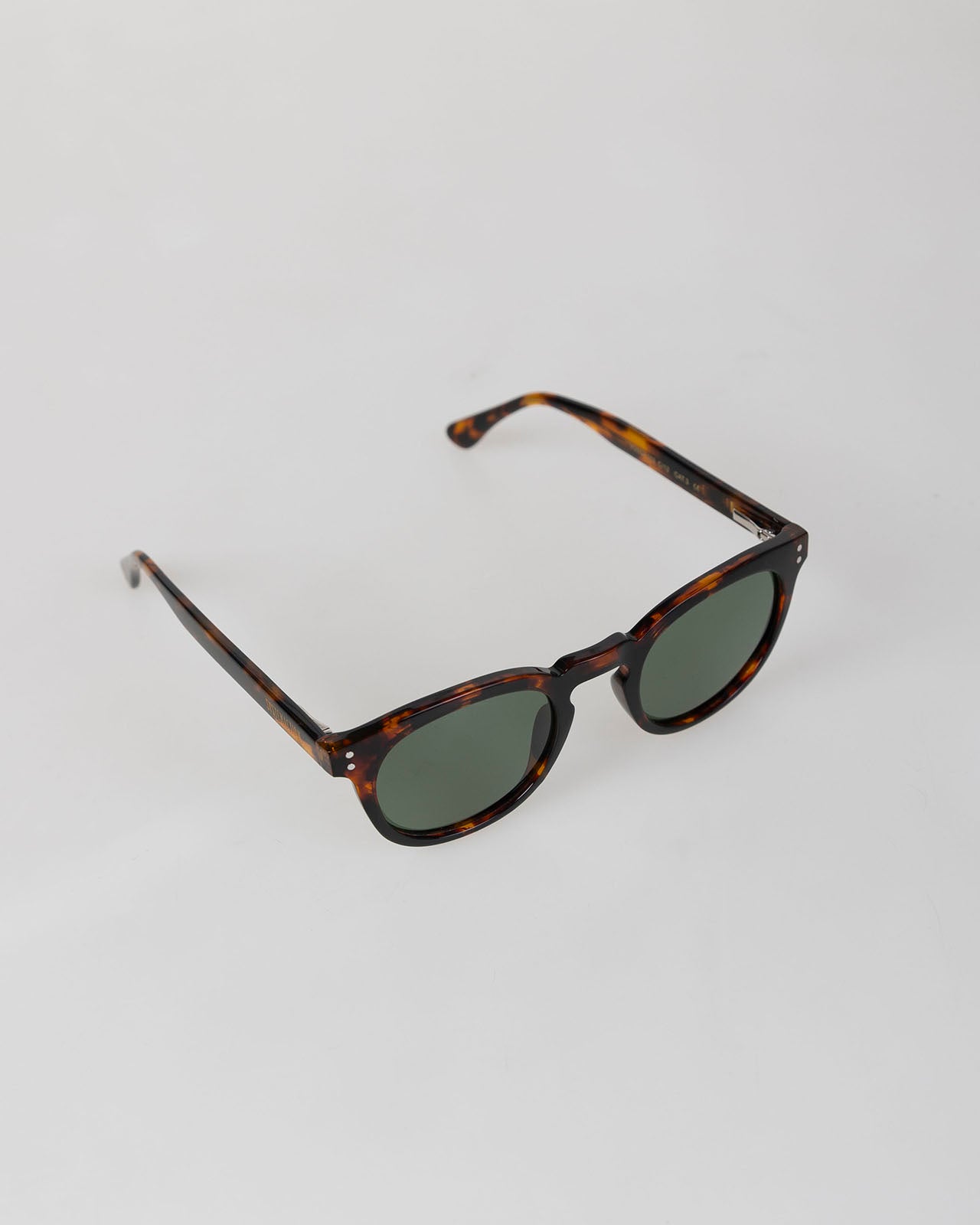 Sunglasses with green frame
