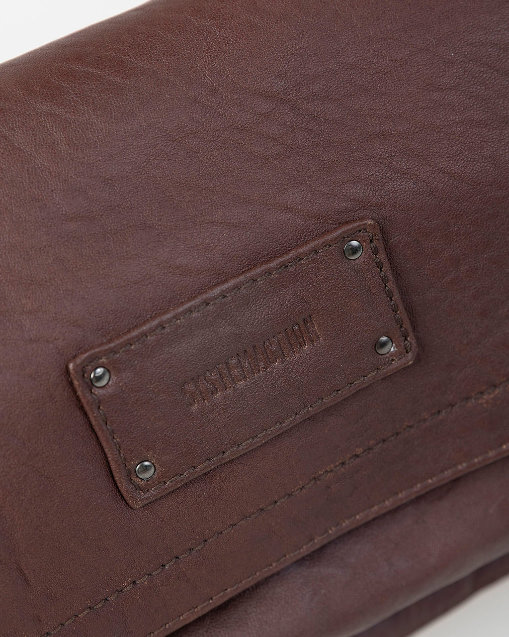 Bolso piel tachas