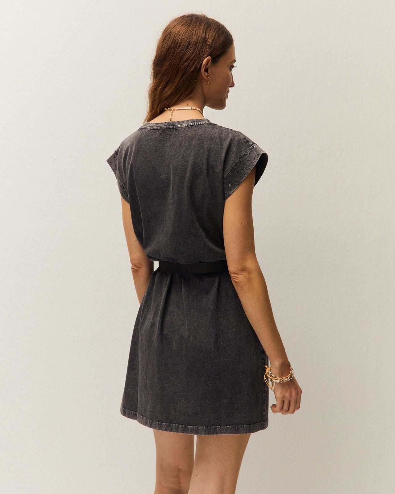 Dress with studs on the sleeves